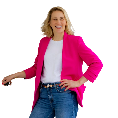 Rebekah Page, The Mortgage Mama, smiling in a bright pink blazer